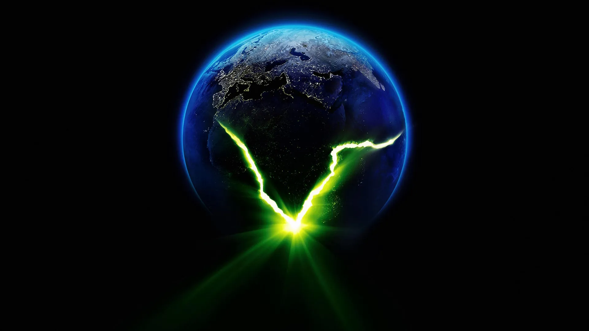 Planet Earth cracked open, with a green light emitting from within.