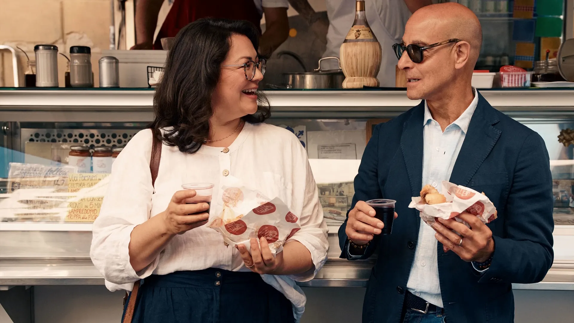 Stanley Tucci enjoying street food in Tucci in Italy.