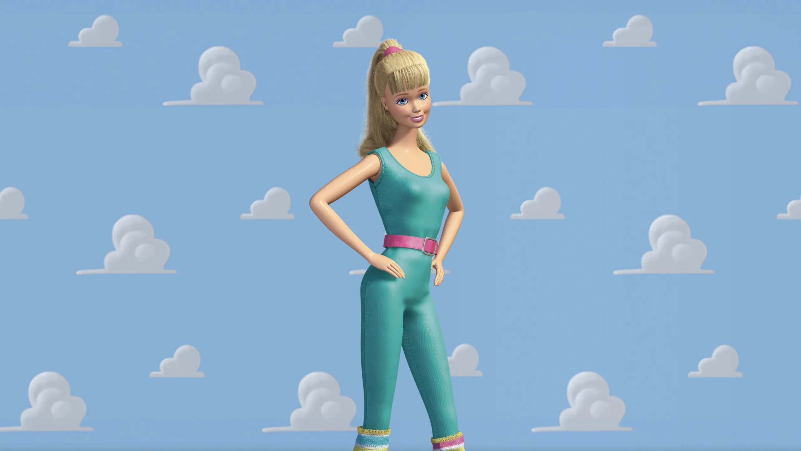 Barbie wearing a teal exercise leotard with a pink belt and her blonde hair in a ponytail