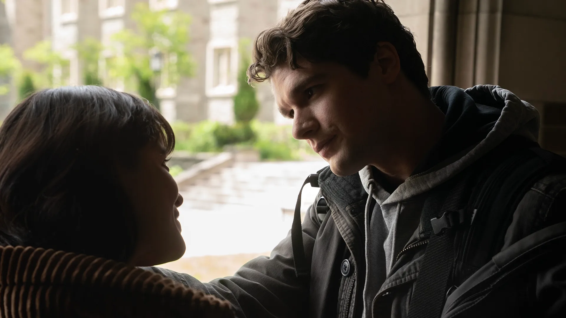 Wrigley (Spencer House) talks to Bree (Catherine Missal) by a window