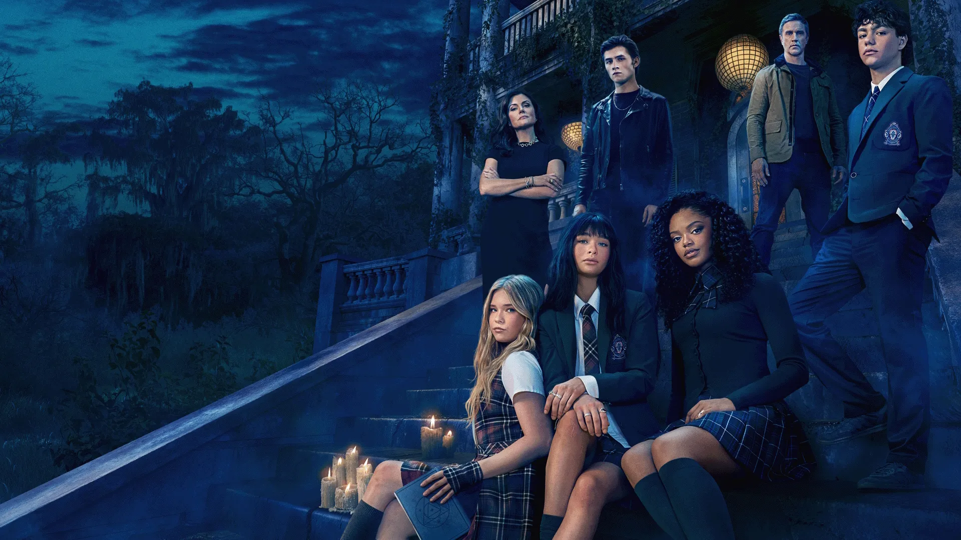Coven Academy key art featuring the cast at the entrance to the school.