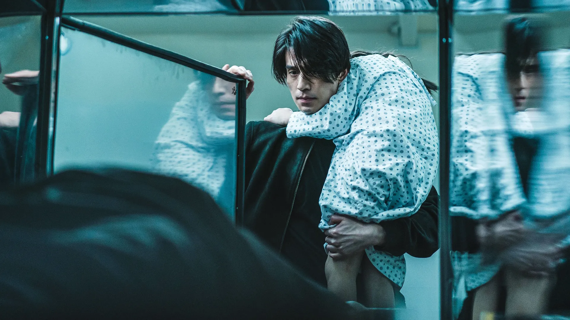 This image features actor Lee Dong-wook starring as the character Jeong Jin-man in the action thriller series A Shop for Killers.