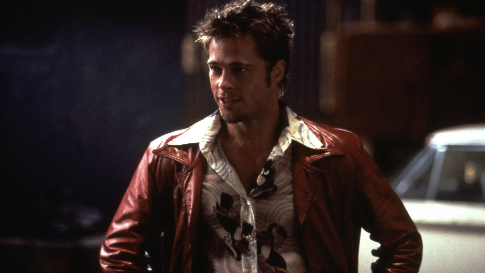 Tyler Durden (Brad Pitt) in a leather jacket in Fight Club.