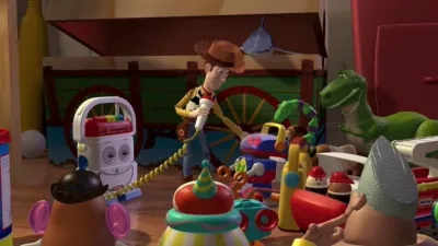 Uma imagem com Woody e outros personagens de Toy Story, como Rex e o sr. Cabeça de Batata