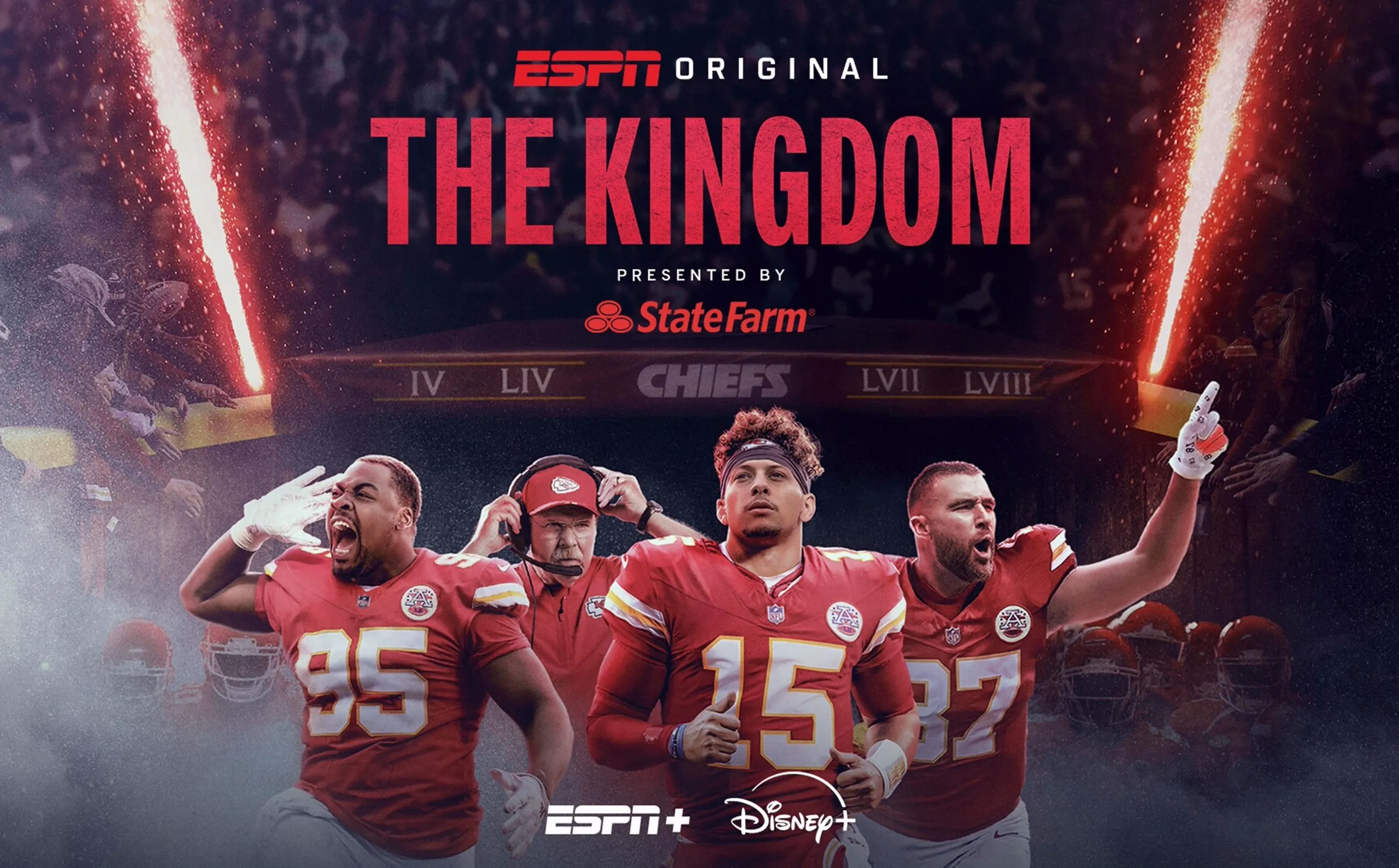 Chris Jones, head coach Andy Reid, Patrick Mahomes, and Travis Kelce running out of the tunnel in front of a crowd.