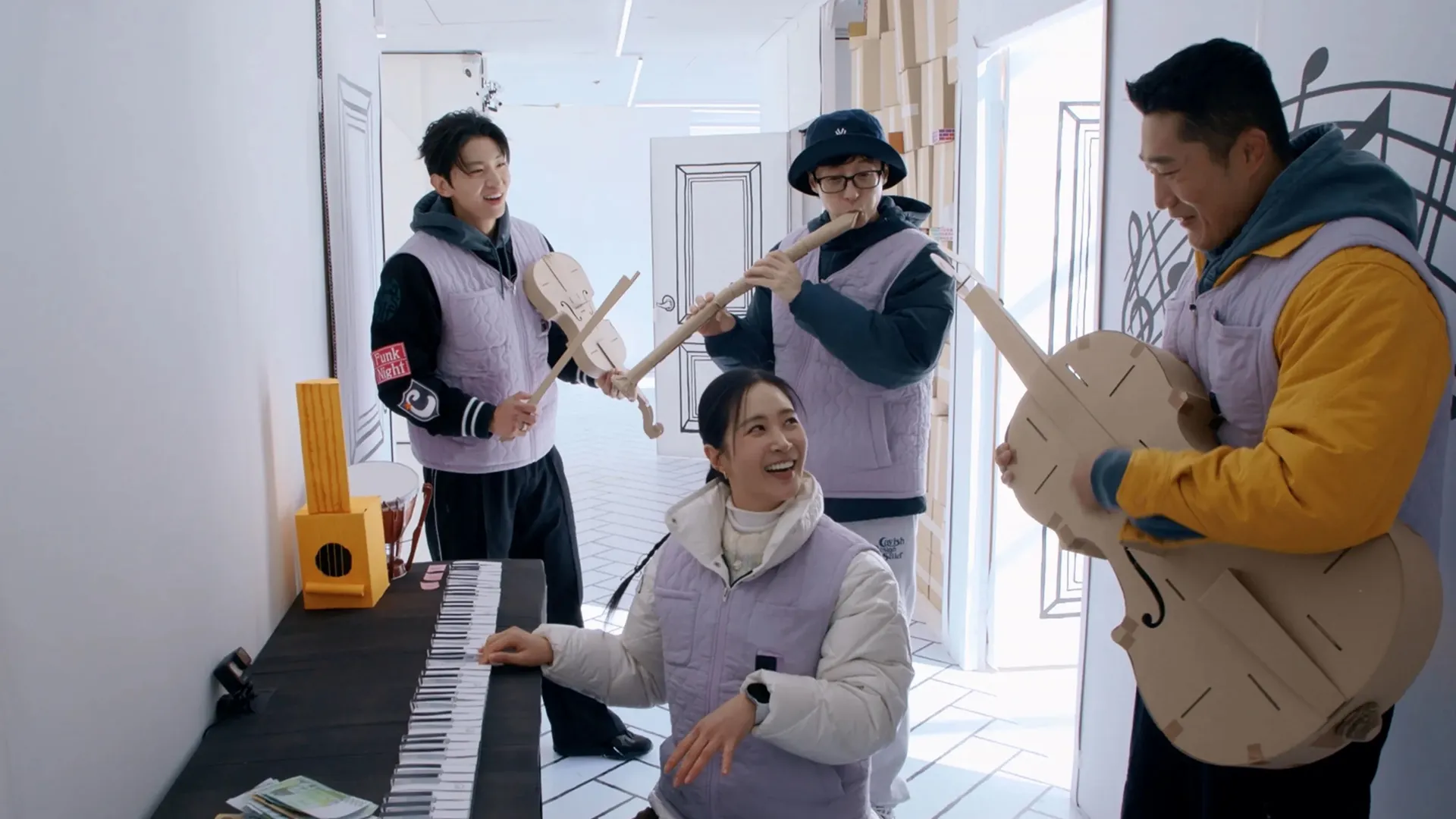 The team come together to play a collection of fake instruments in The Zone: Survival Mission. 