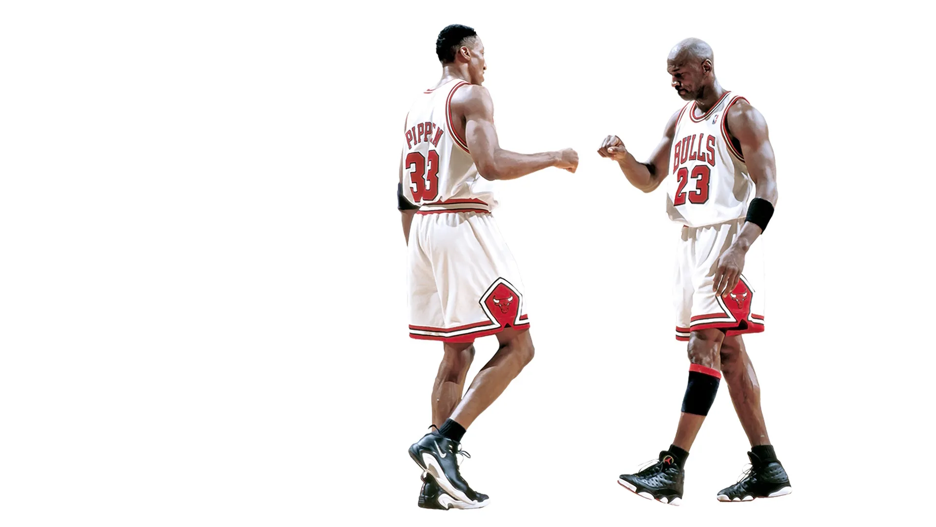 Chicago Bulls legends Scottie Pippen (left) and Michael Jordan (right) celebrate with a fist bump during their dominant championship era