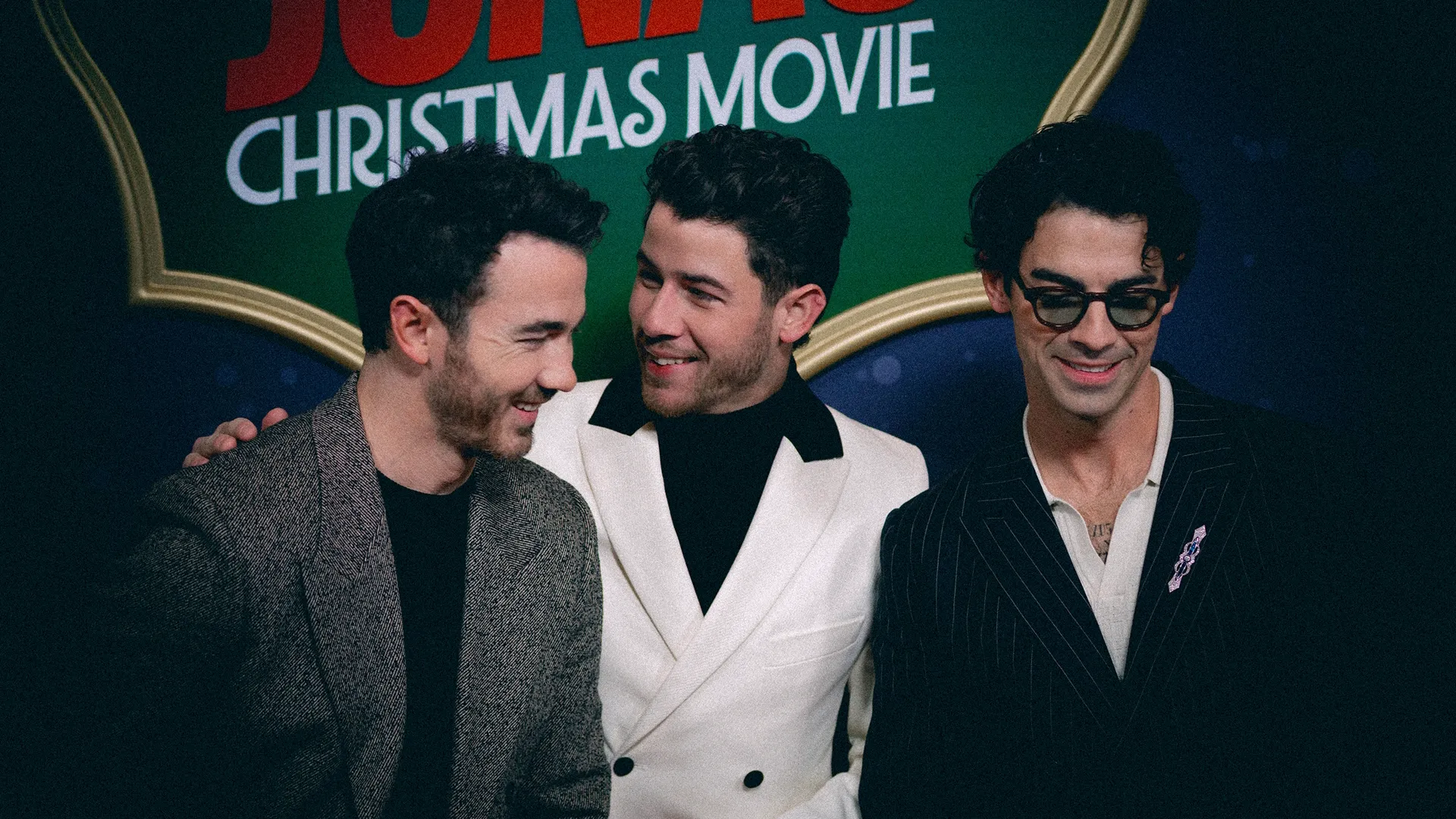 The Jonas Brothers (L-R: Kevin Jonas, Nick Jonas, and Joe Jonas) at the Red Carpet premiere of A Very Jonas Christmas.