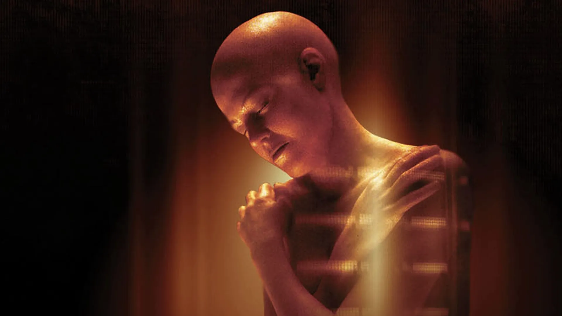 A naked and bald clone of Ellen Ripley (Signourey Weaver).