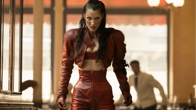 Bella Hadid wearing a red leather outfit in FX's The Beauty.