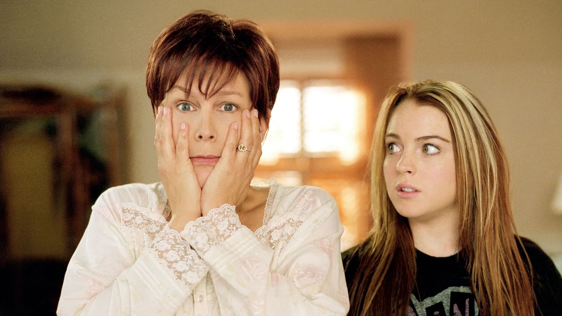 A shocked Tess Coleman (Jamie Lee Curtis) and Anna Coleman (Lindsay Lohan) after switching bodies in Freaky Friday, 2003.