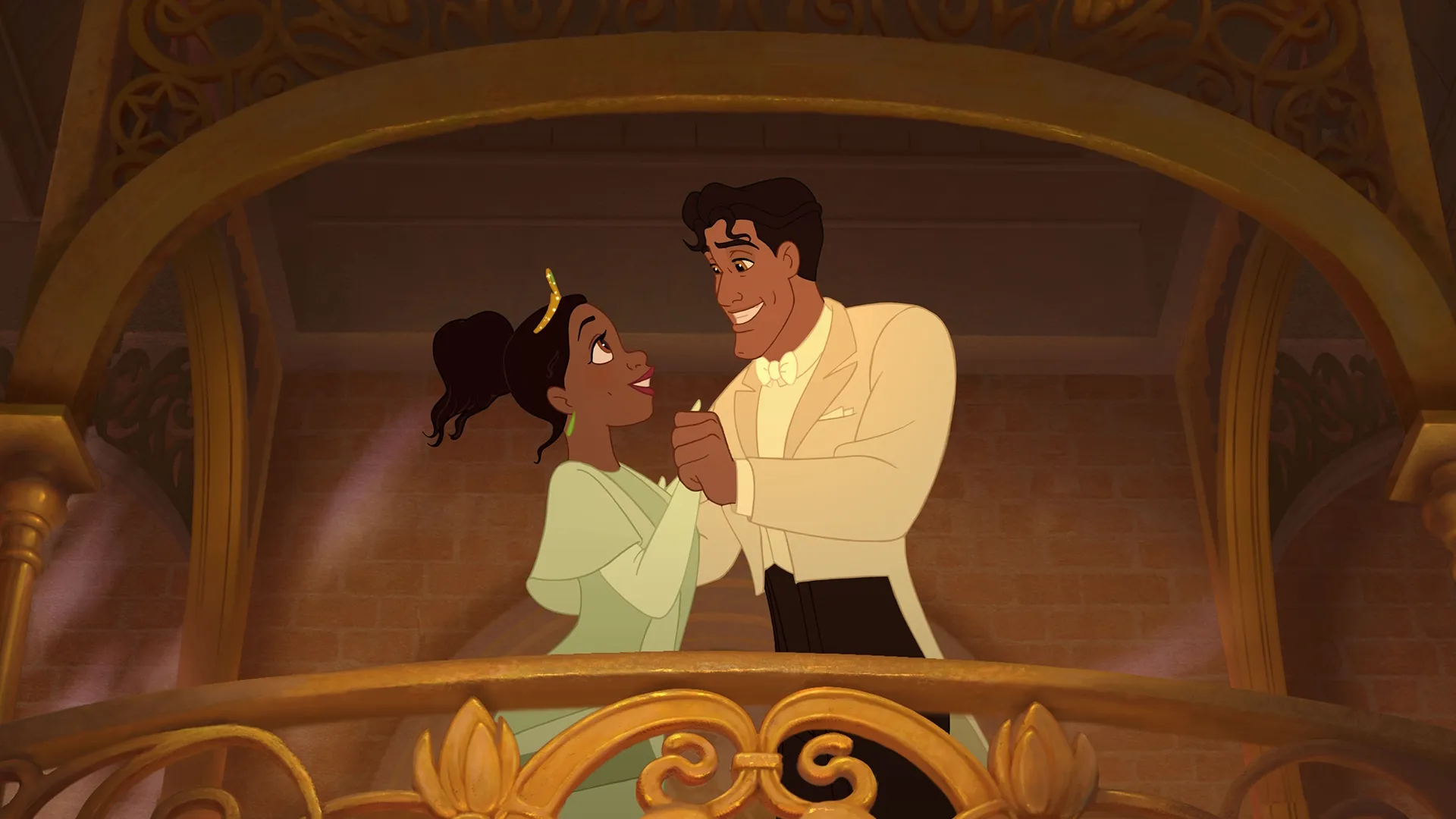 Tiana holding Prince Naveen in frog-form