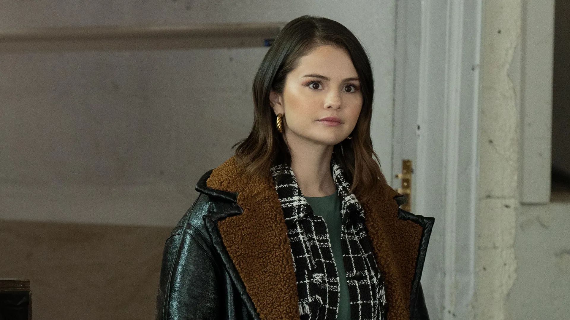This image features Selena Gomez as Mabel Mora from the Hulu series Only Murders in the Building.