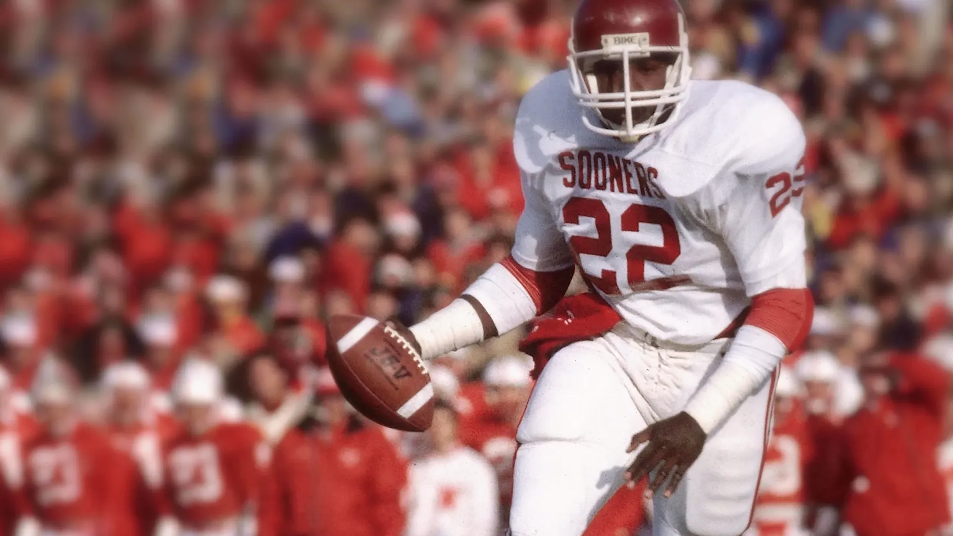 Marcus Dupree runs with the football.
