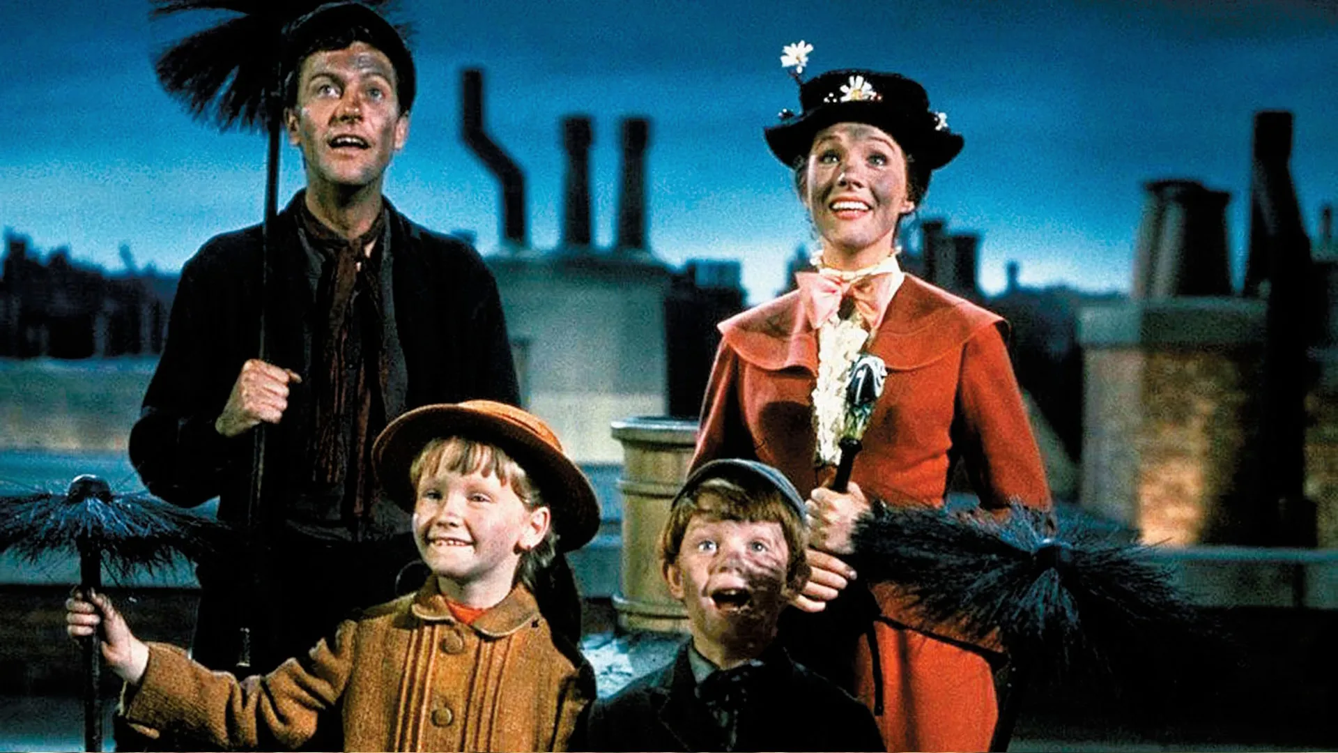 Dick Van Dyke, Julie Andrews, Karn Dotrice, and Matthew Garber in Mary Poppins