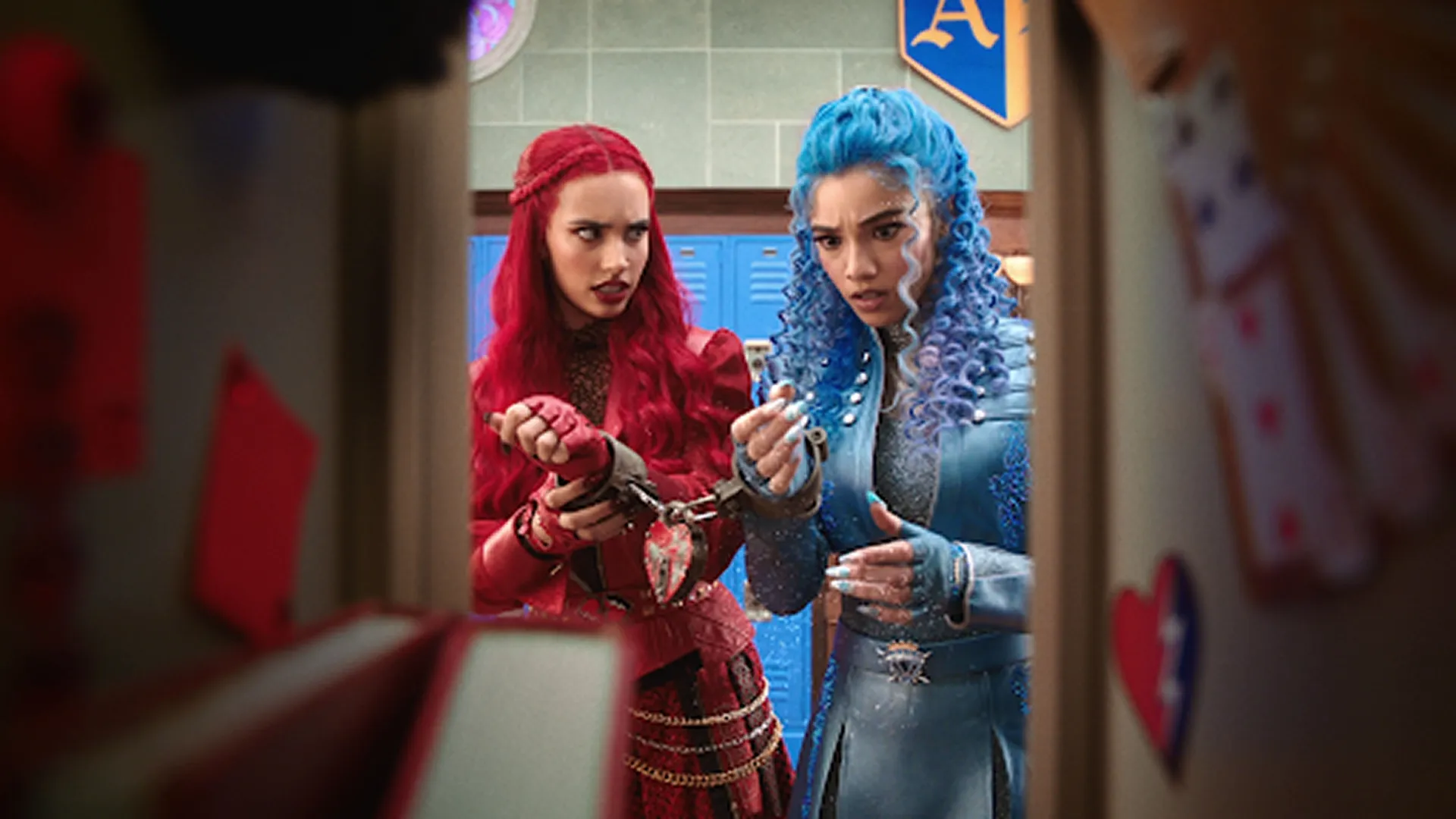 This image features characters from the Descendants franchise, specifically from Descendants: The Rise of Red.