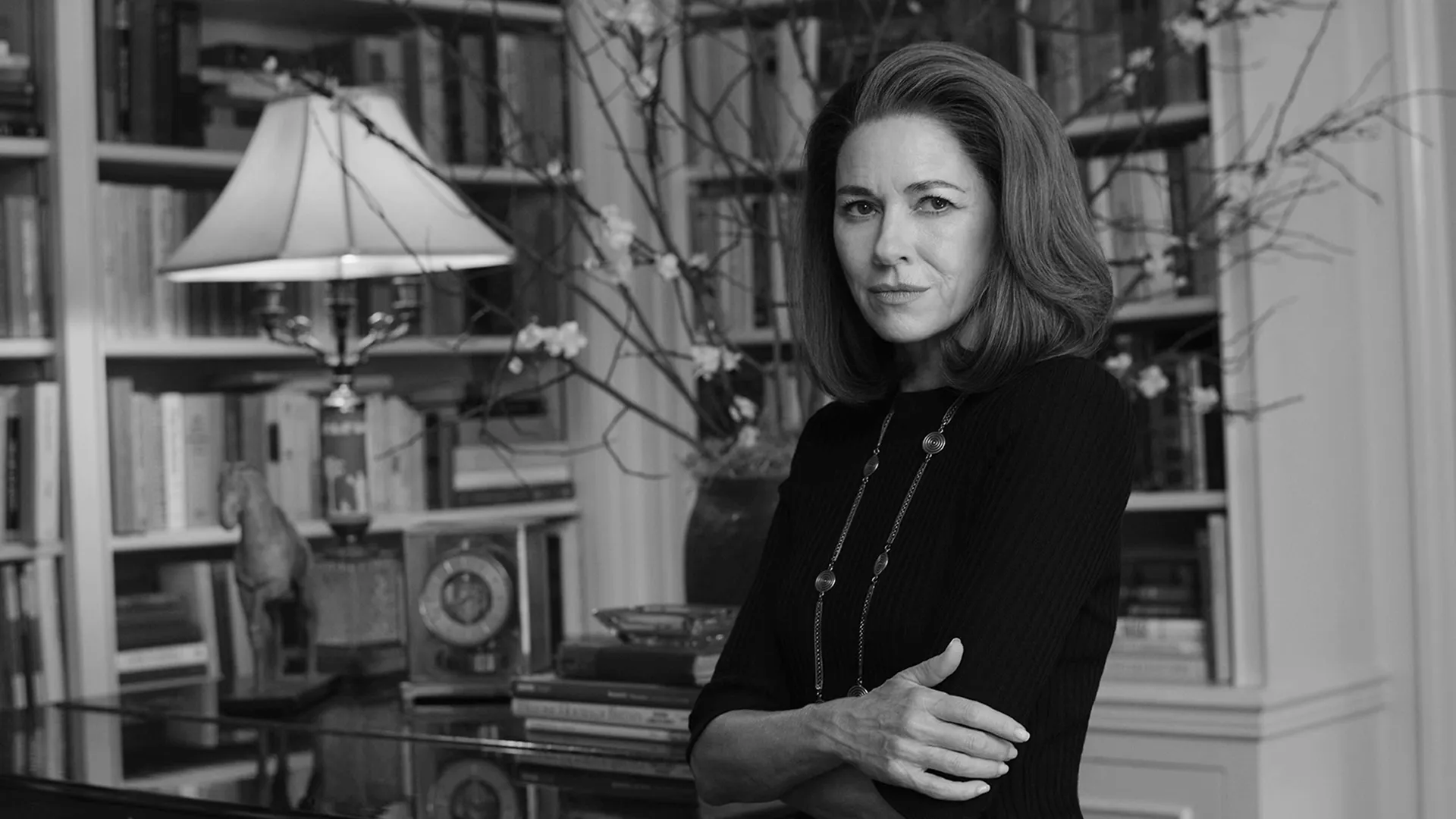 Jackie Kennedy Onassis (Naomi Watts) in a black and white set photo from FX's Love Story.