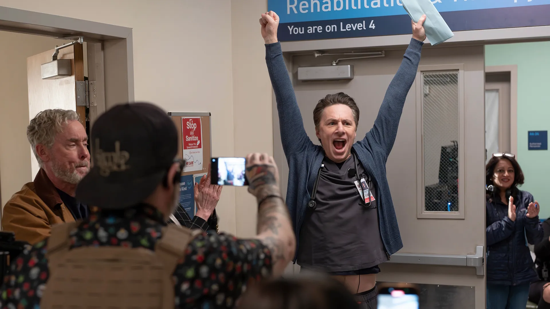 Scrubs Season 1 BTS Image 12 | Zach Braff celebrating