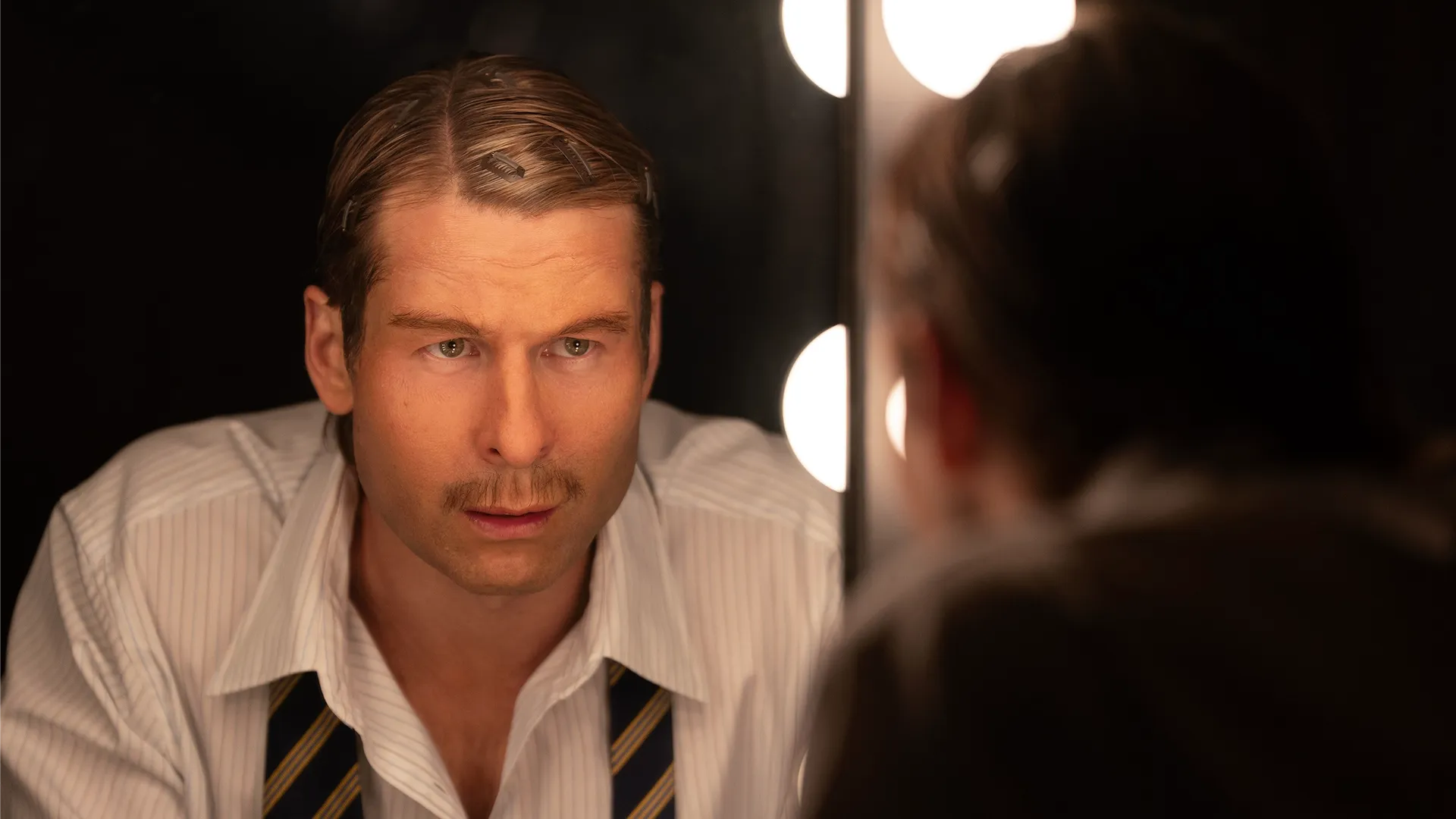 Chad Powers preparing his disguise in Chad Powers