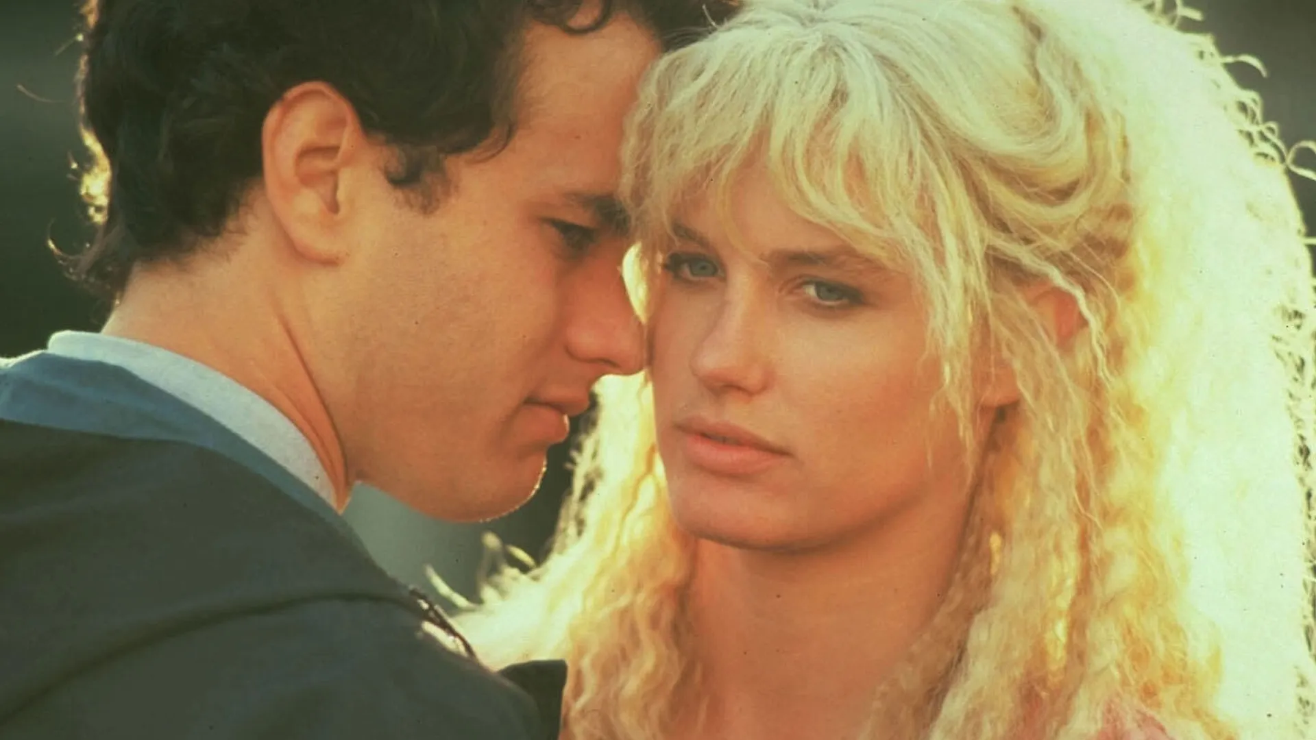 An image showing actors Daryl Hannah as Madison and Tom Hanks as Allen Bauer in the 1984 romantic comedy fantasy film Splash