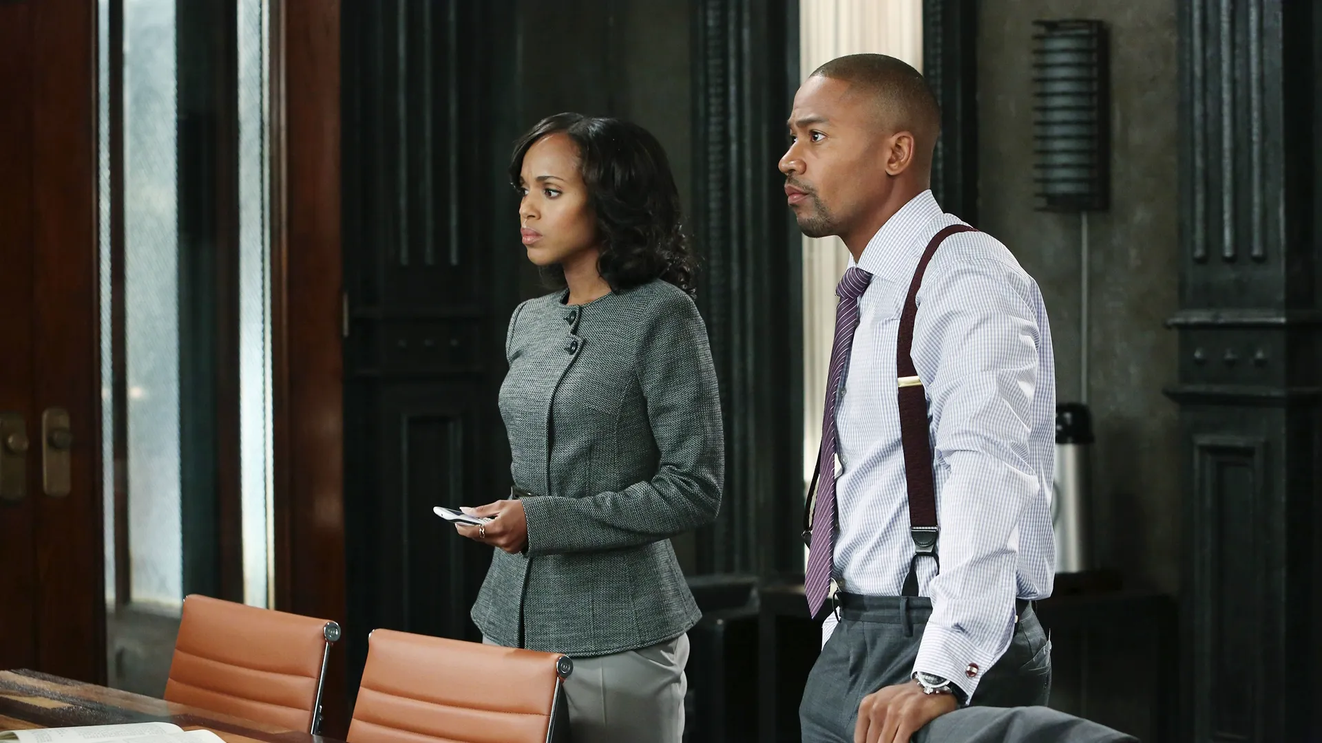 Olivia Pope (Kerry Washington) and Harrison Wright (Columbus Short) from Scandal.