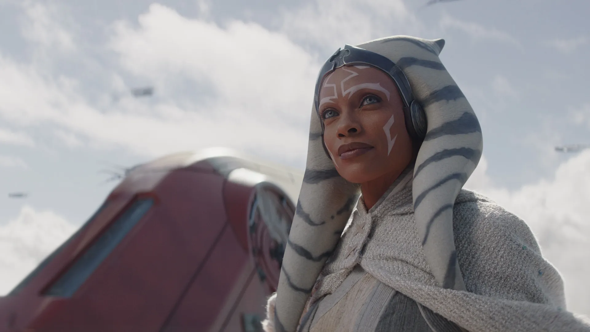 This image shows Ahsoka Tano, a character from the Star Wars universe, played by Rosario Dawson in the live-action series Ahsoka. 