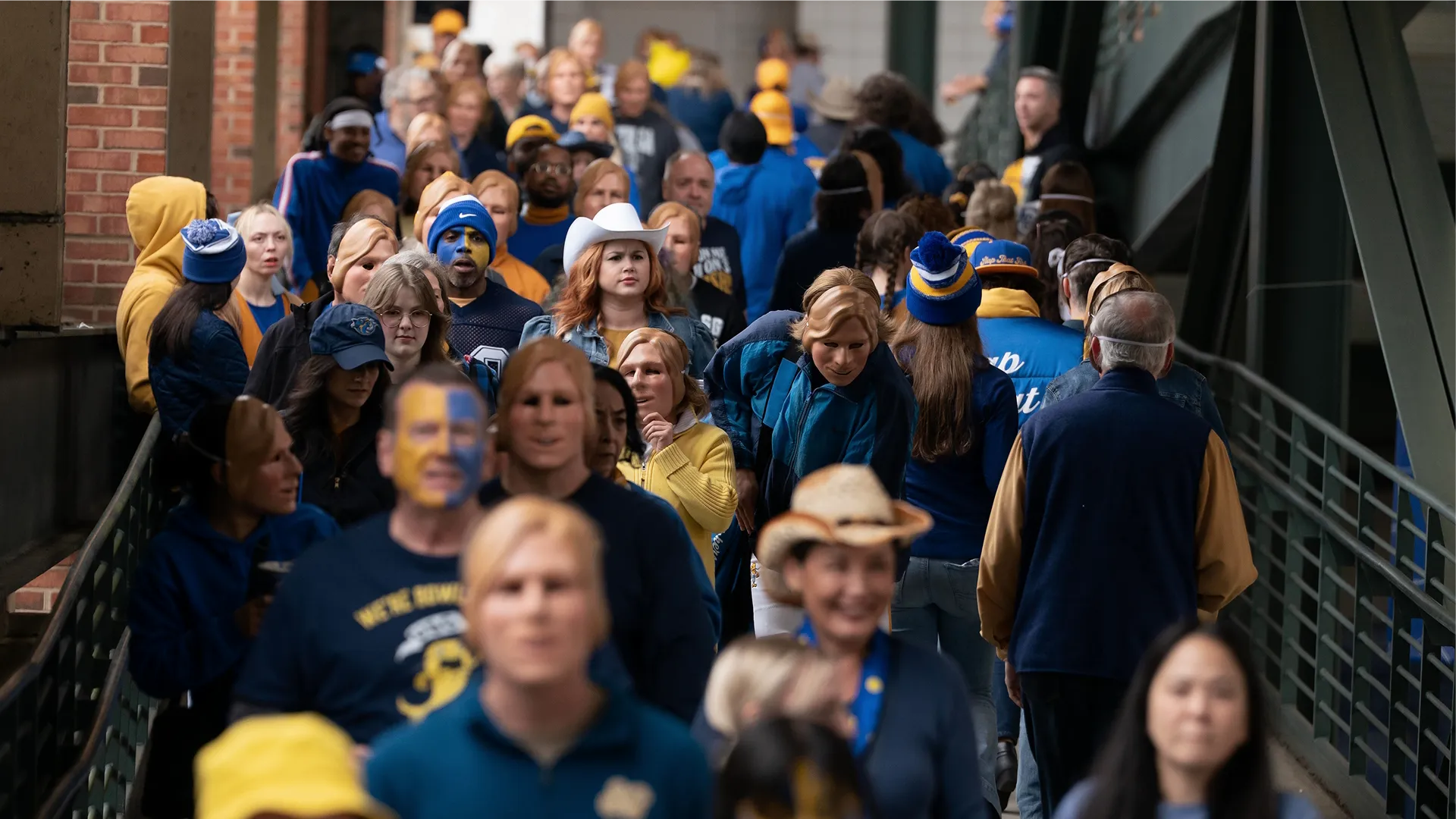 Chad Powers walking through a crowd of South Georgia Catfish football fans in Chad Powers