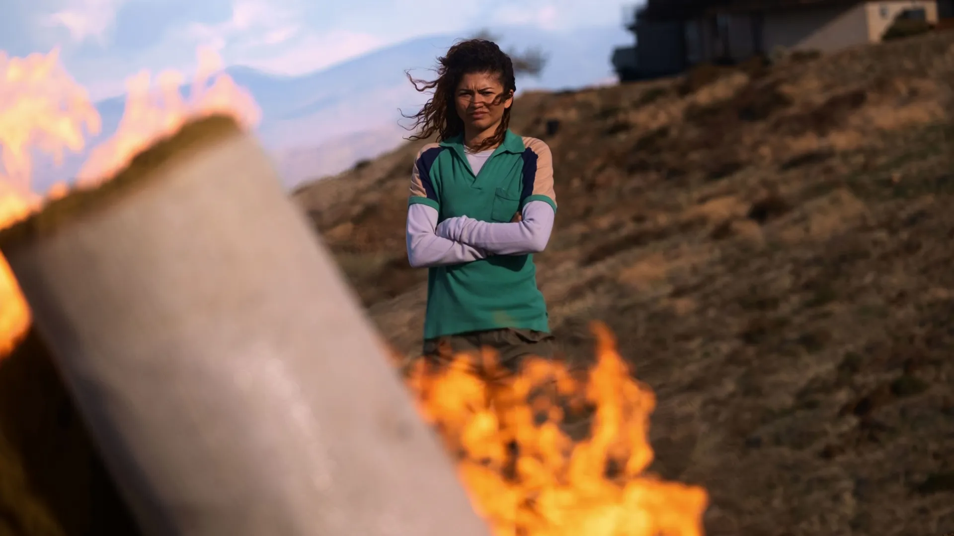 Rue (Zendaya) watches a fire in Euphoria