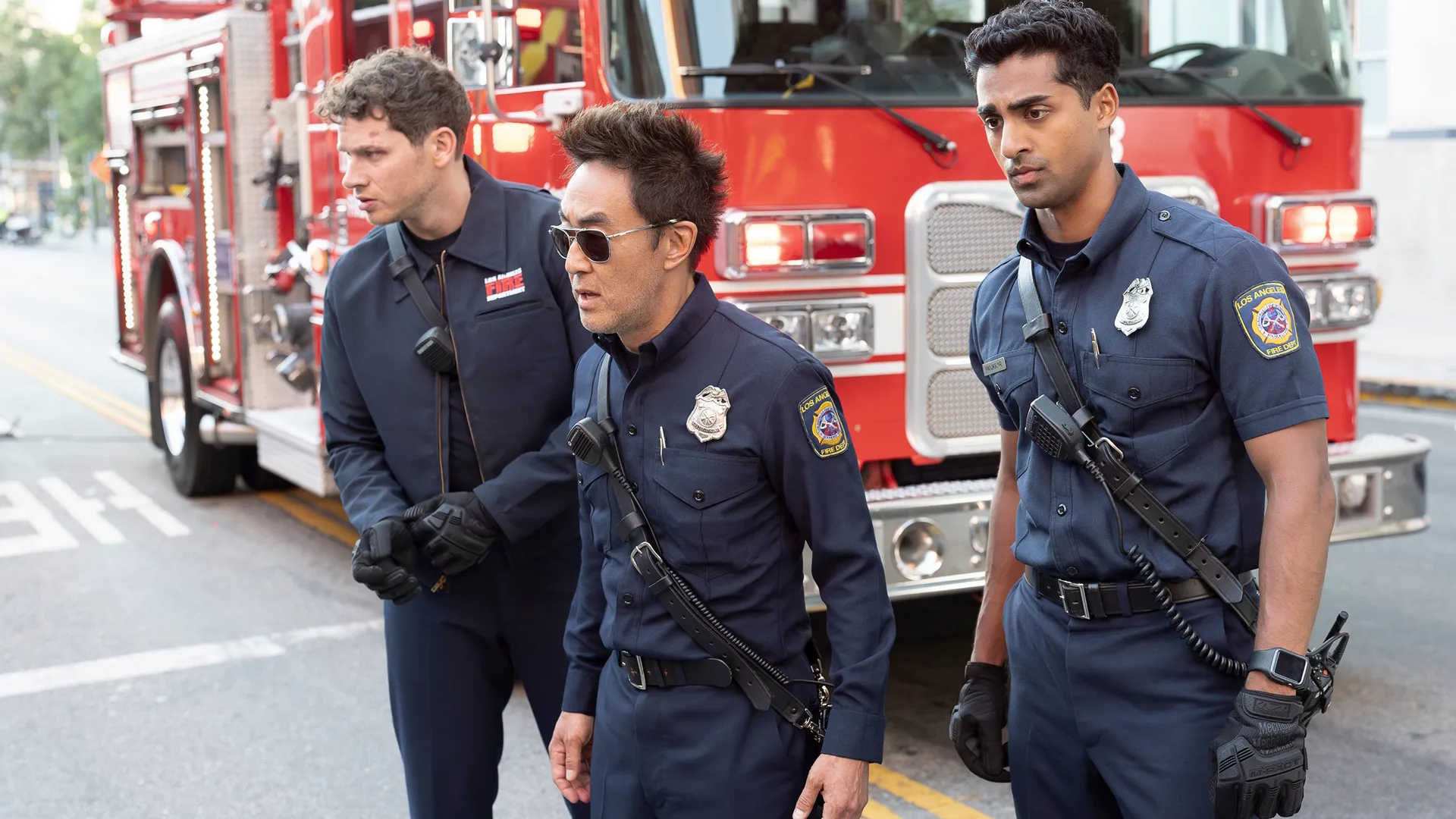 From left to right Oliver Stark as Evan "Buck" Buckley. Kenneth Choi as Howard "Chimney" Han and Anirudh Pisharody as Ravi Panikkar.