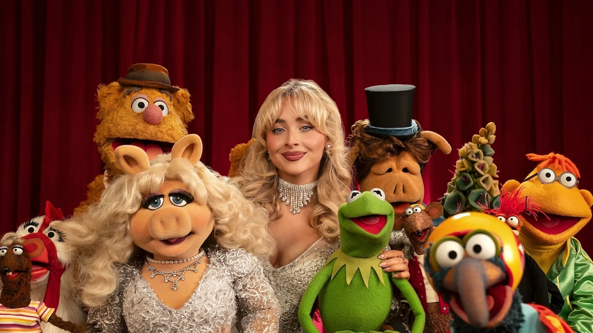 Sabrina Carpenter surrounded by Muppets, including Kermit and Ms. Piggy.