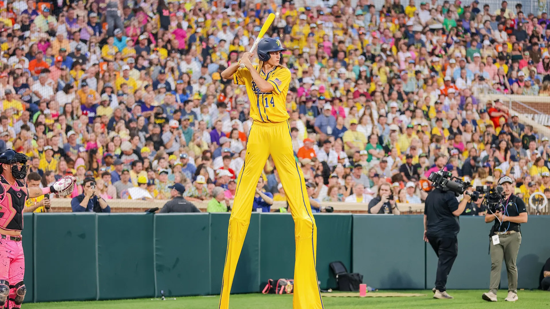 Dakota Albritton batting in stilts.