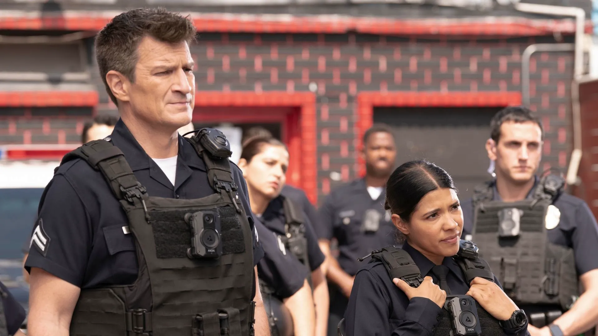 Nathan Fillion as John Nolan and Lisseth Chavez as Celina Juarez in The Rookie
