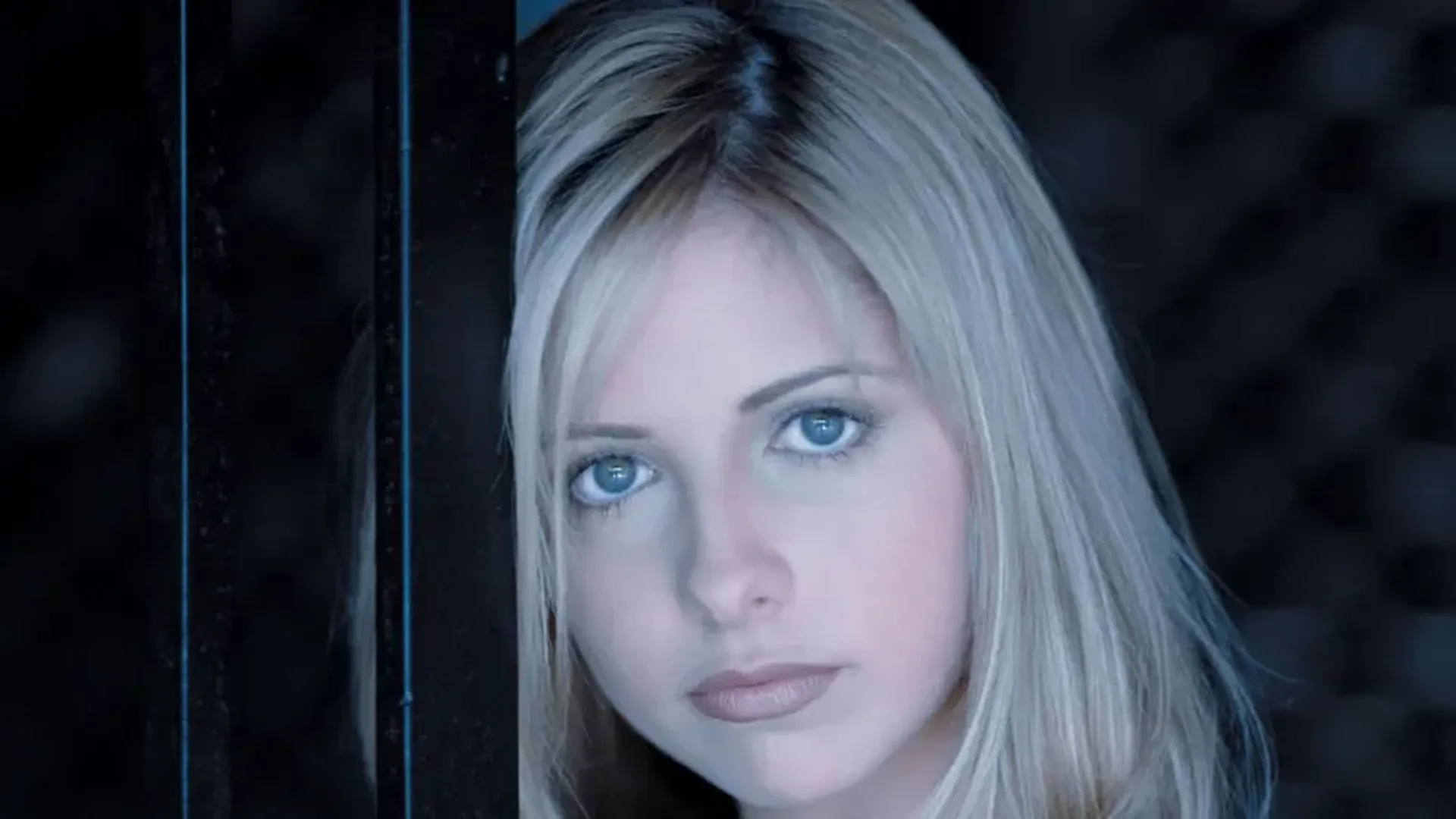 A closeup of Buffy Anne Summers (Sarah Michelle Gellar).