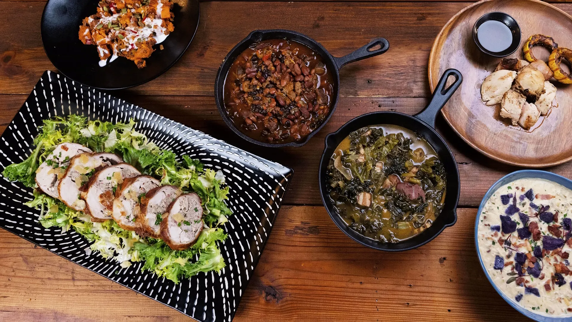 Table filled with mouthwatering BBQ dishes.