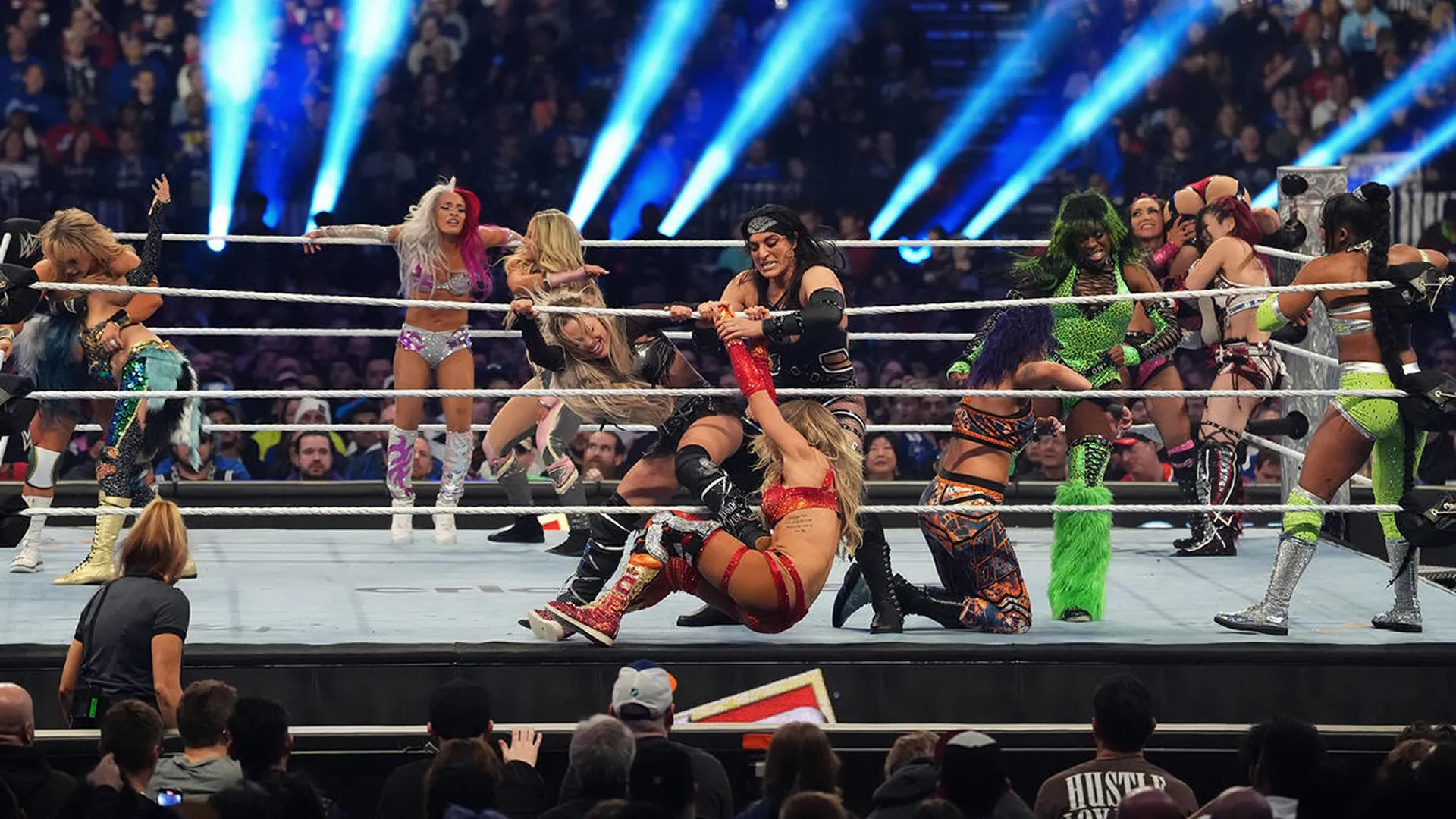 13 female wrestlers wrestling in the ring at WWE Royal Rumble