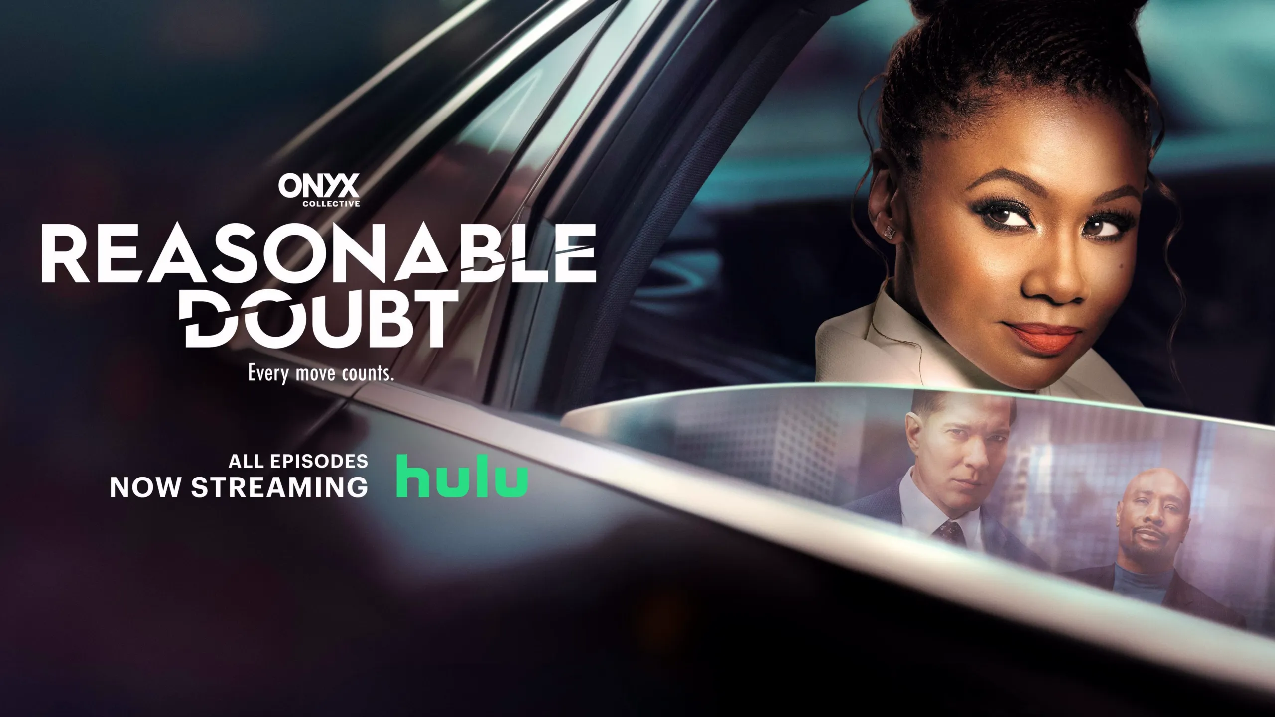 Jax Stewart, played by Emayatzy Corinealdi looks out of a car window that's partly rolled down. In the window's reflection we see two men