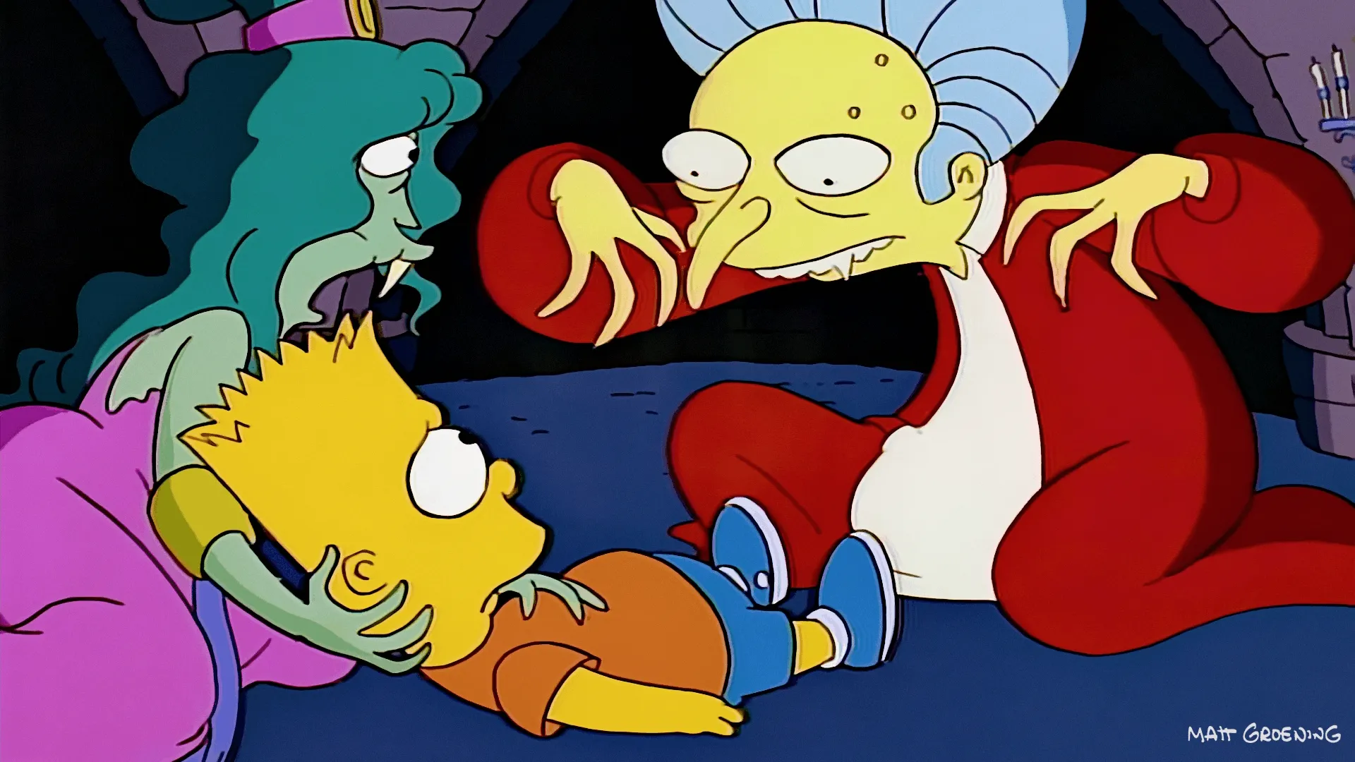 Mr. Burns, styled as a vampire in a red robe with elaborate white hair, hovers menacingly over Bart Simpson while a green-skinned vampire woman cradles Bart's head.