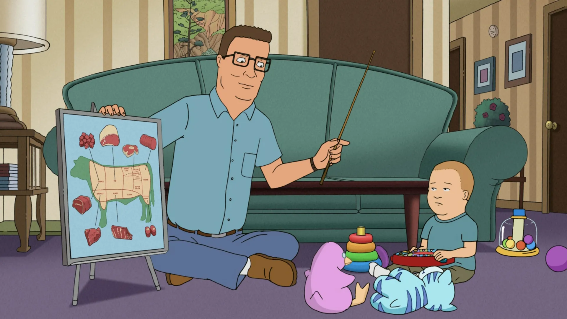Hank (Mike Judge) points to a chart of beef cuts while a young Bobby (Pamela Adlon) sits among children’s toys.