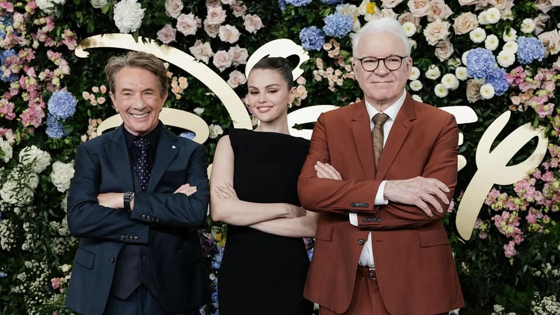Martin Short, Selena Gomez, and Steve Martin pose together at the Disney Upfront 2025 event.