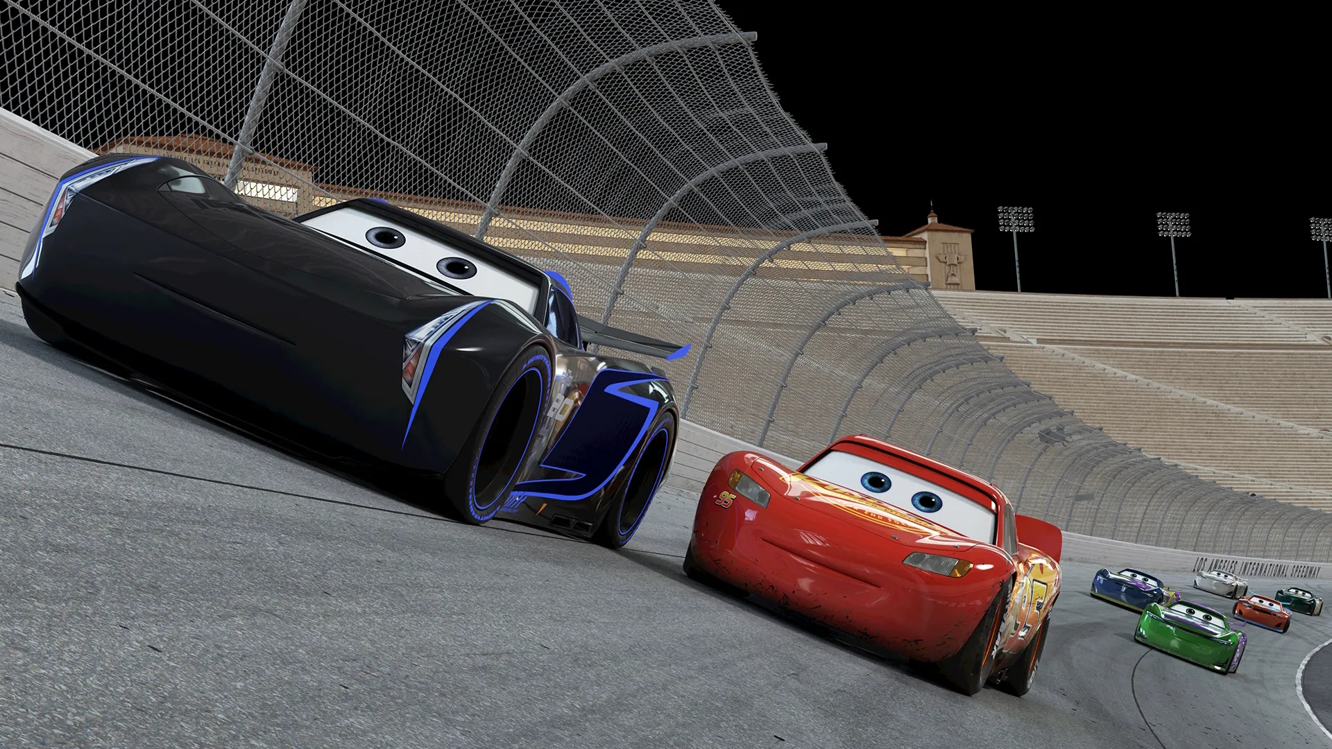 Lightning Mcqueen races with a few cars