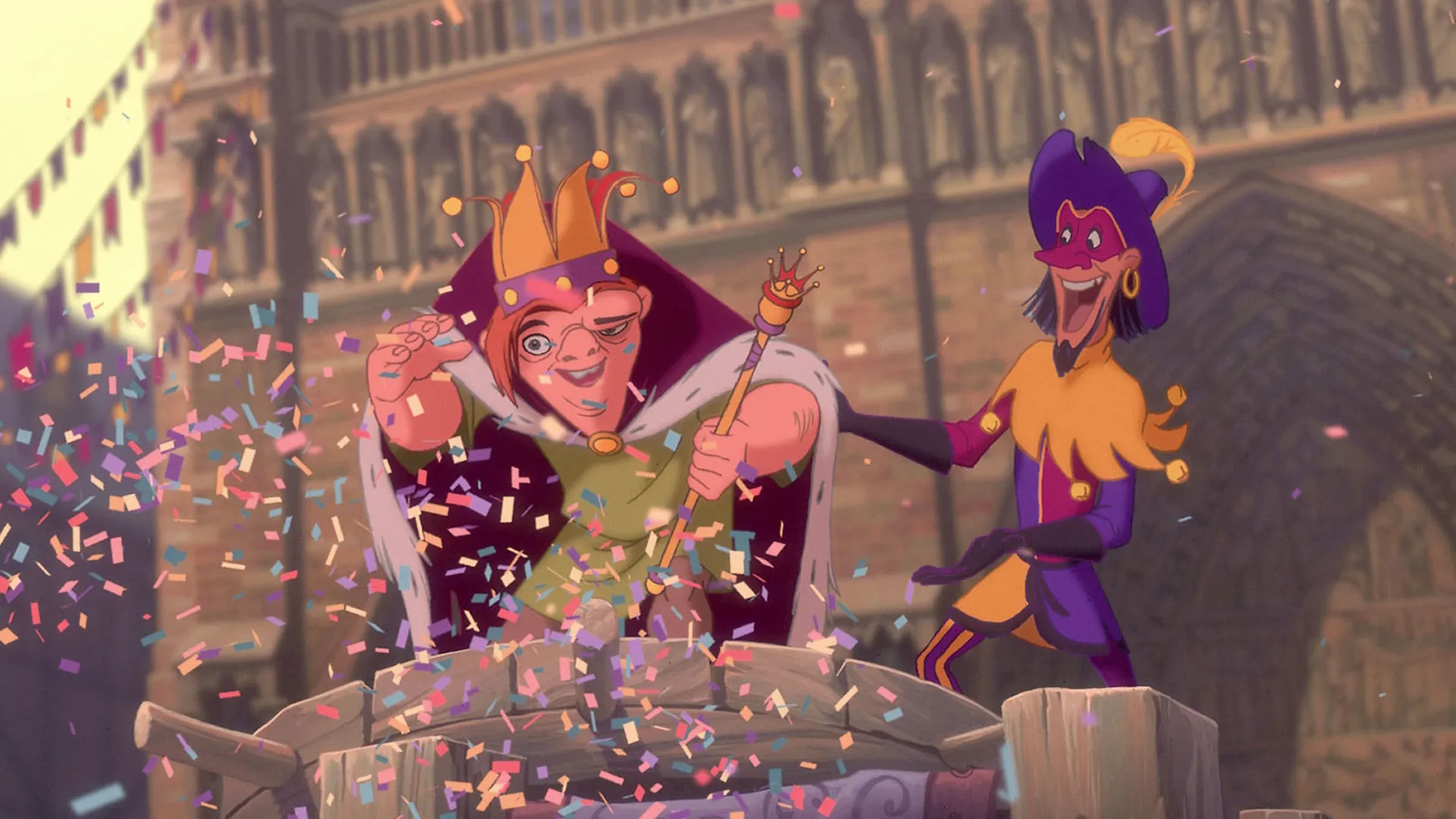 Quasimodo being crowned as the "King of Fools," and Clopin Trouillefou, the jester leading the celebration in The Hunchback of Notre Dame
