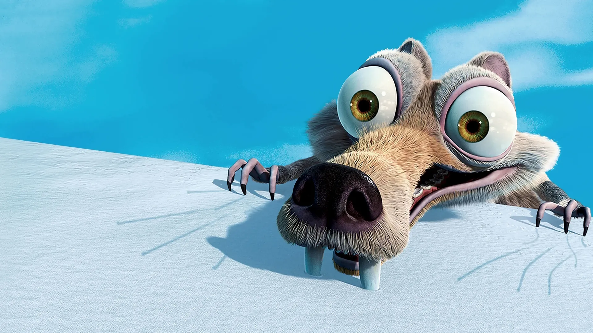 Scrat, the frantic saber-toothed squirrel from Ice Age, peer anxiously over the edge of a snowy white glacier cliff with wide, bulging eyes against a bright blue sky.