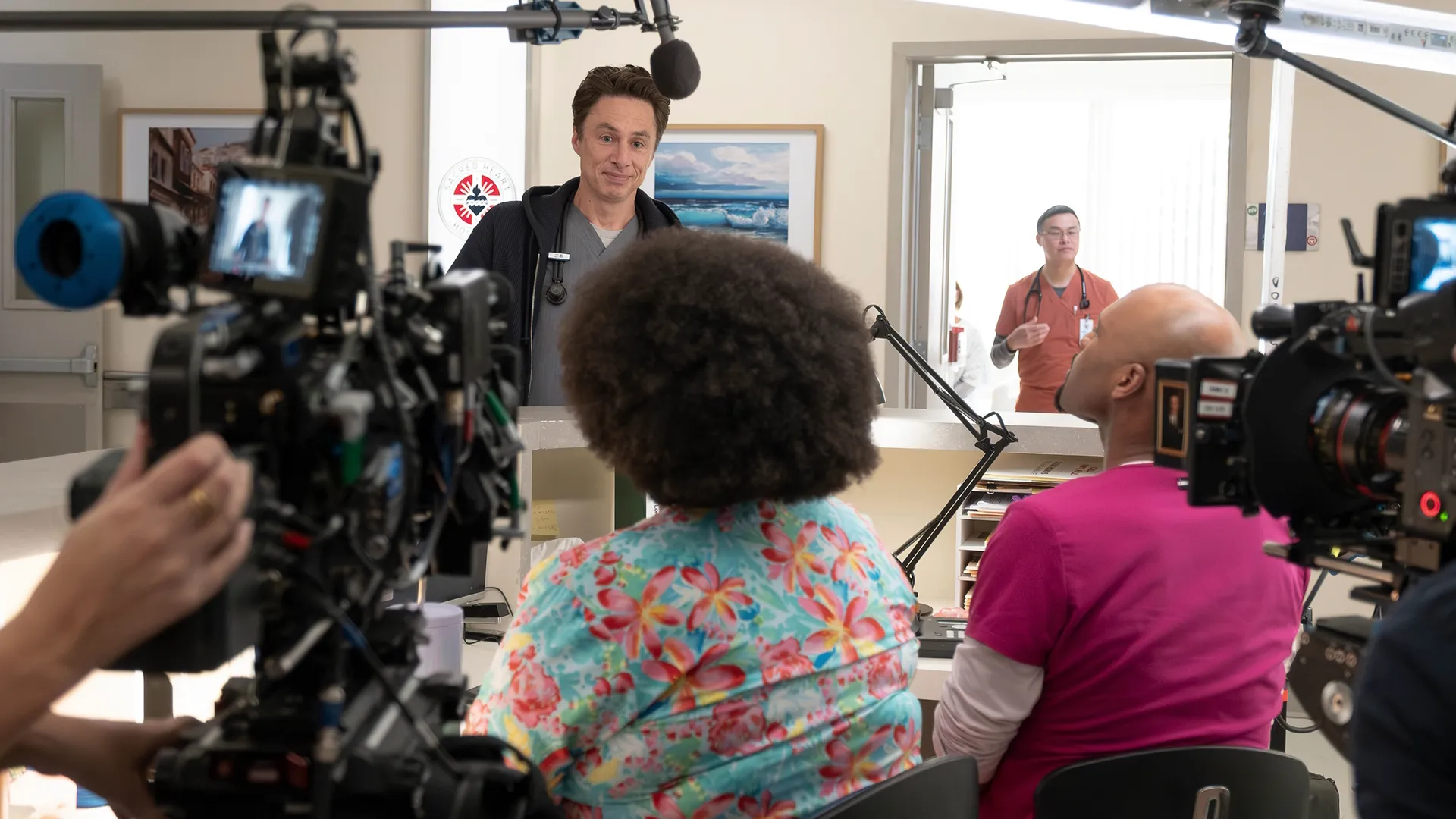 Scrubs Season 1 BTS Image 10 | BTS shot of the crew filming Zach Braff