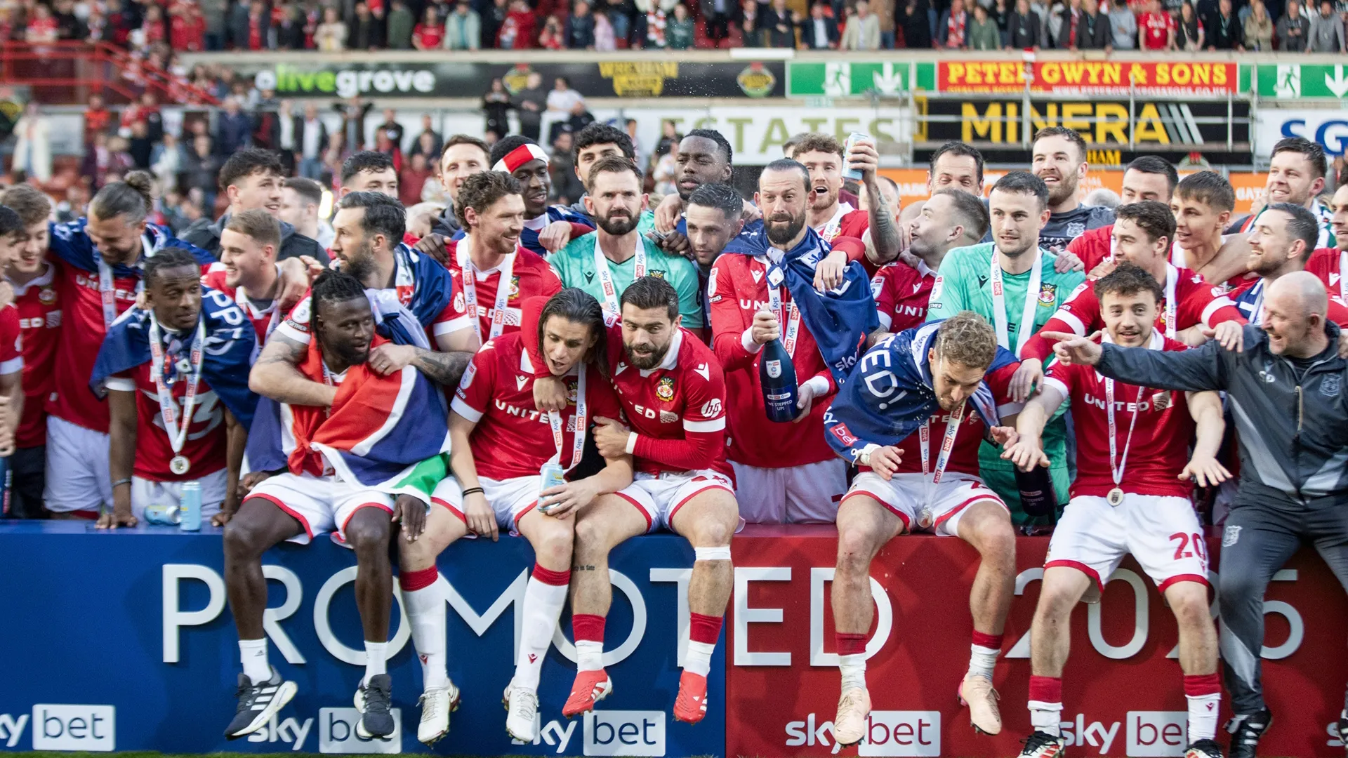 The Wrexham AFC team celebrate their 2025 promotion