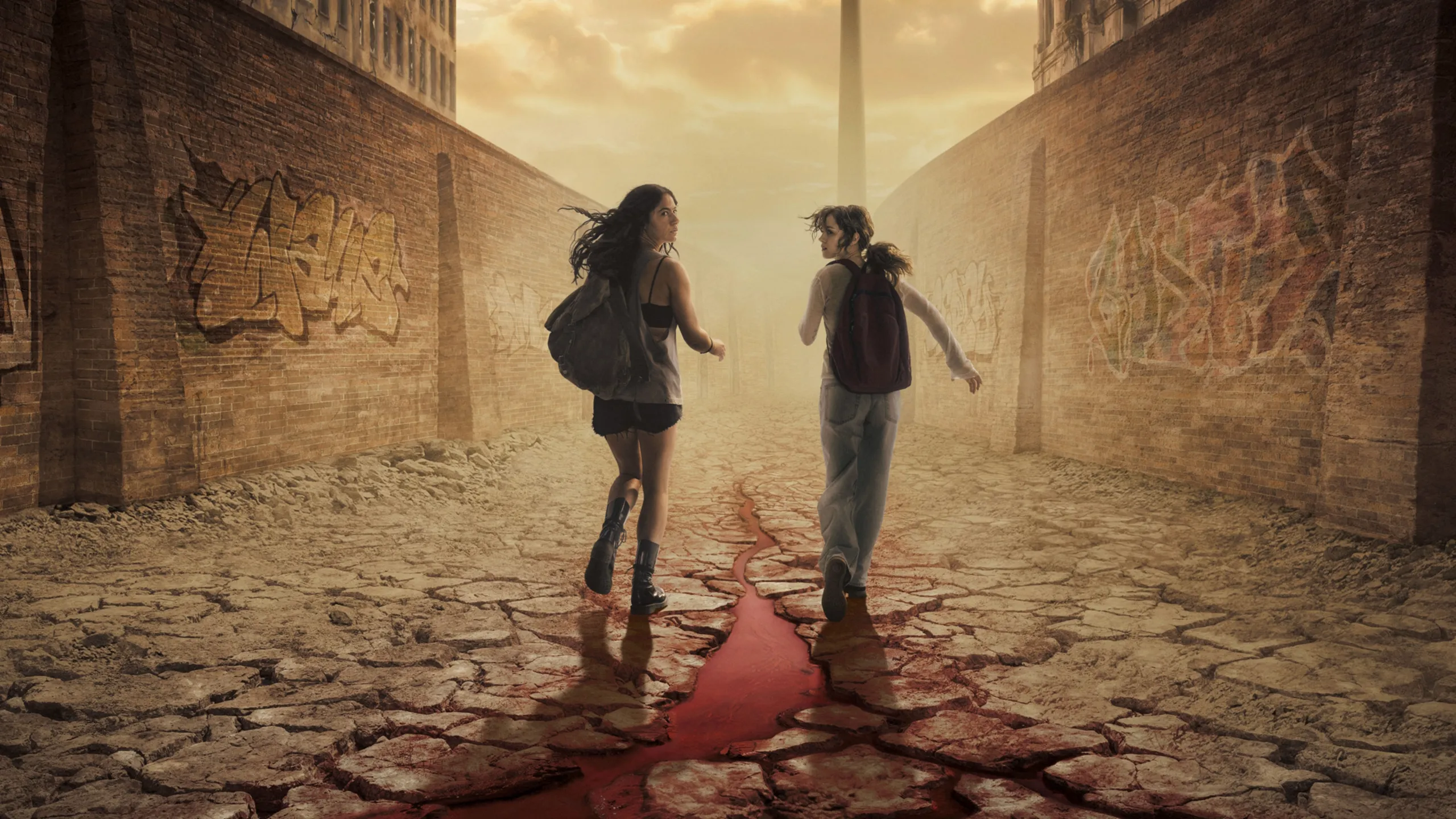 Bea and Phoebe stand against the backdrop of a dystopian Berlin in City of Blood.
