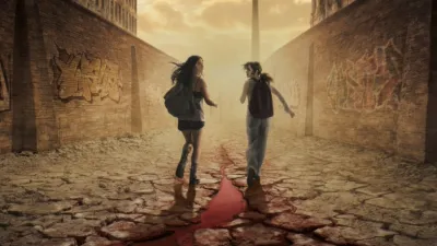 Bea and Phoebe stand against the backdrop of a dystopian Berlin in City of Blood.