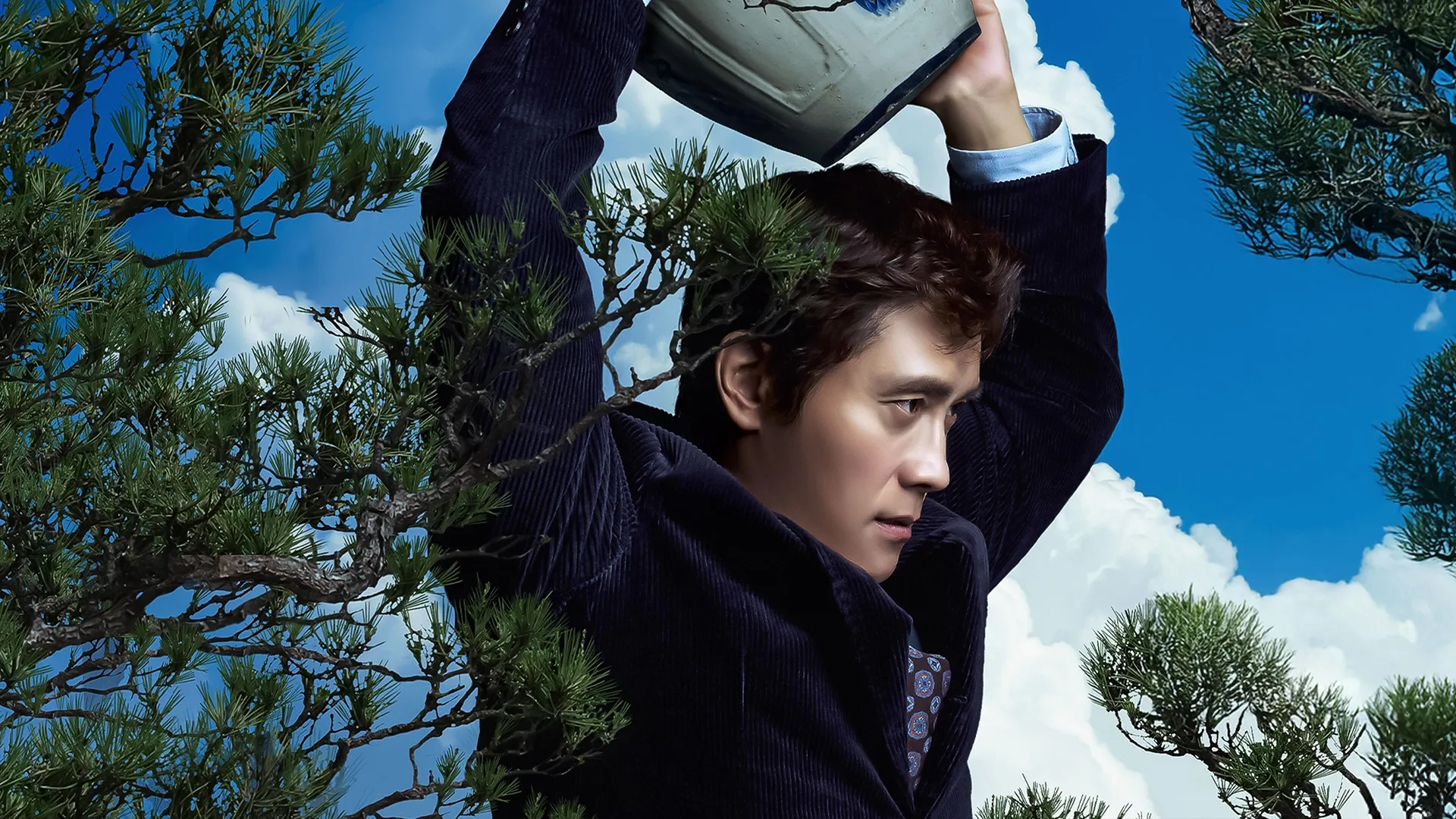 This image shows actor Lee Byung-hun in a scene from the film "No Other Choice". 