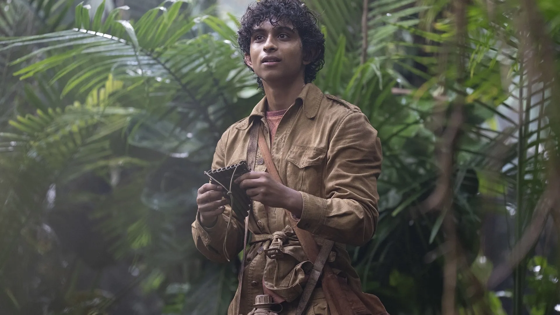 Aryan Simhadri as Grover Underwood in the Disney+ series Percy Jackson and the Olympians. 