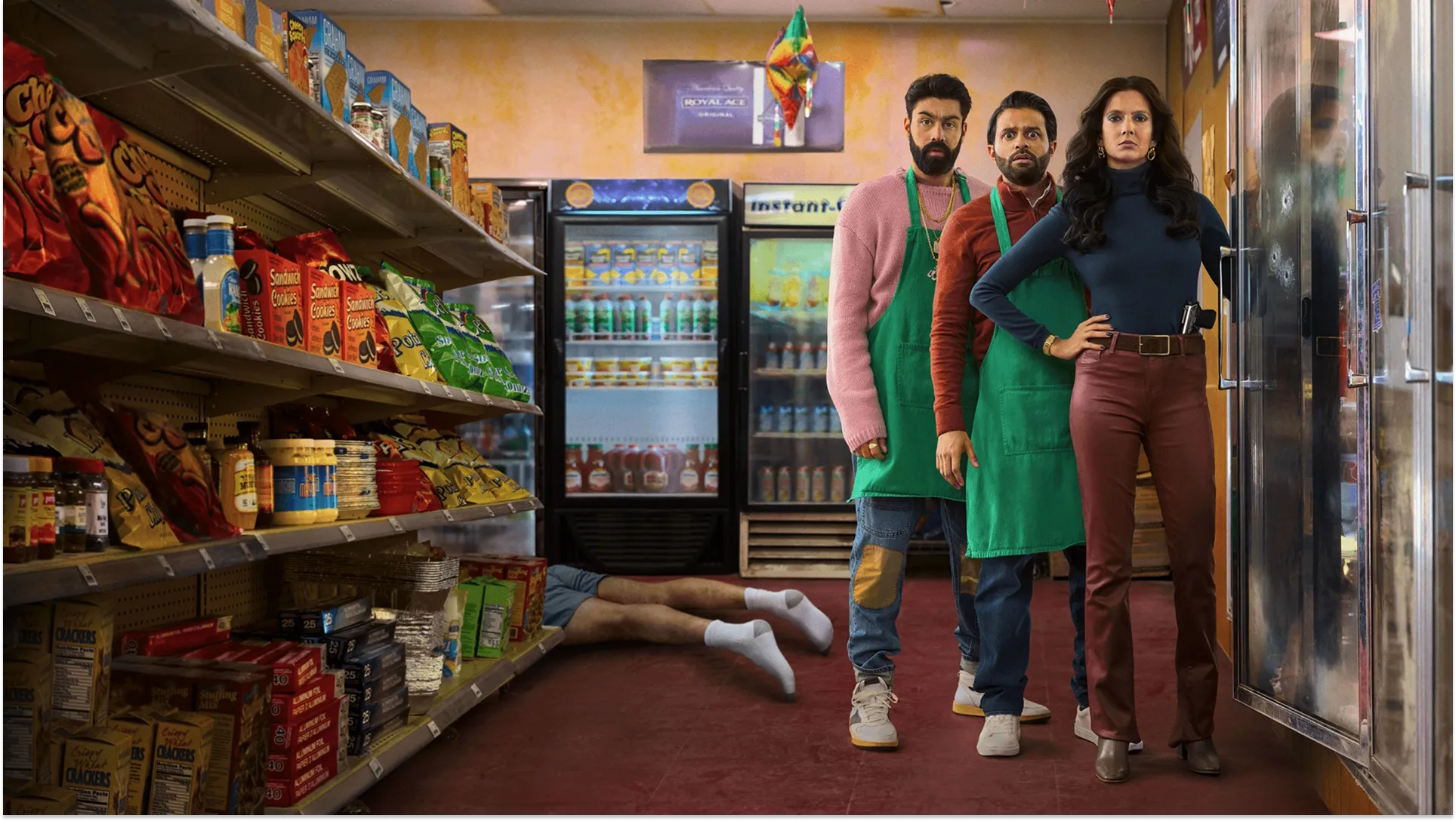 Key art for Deli Boys Season 2 featuring the main cast members covered in a pool of 100 dollar bills.