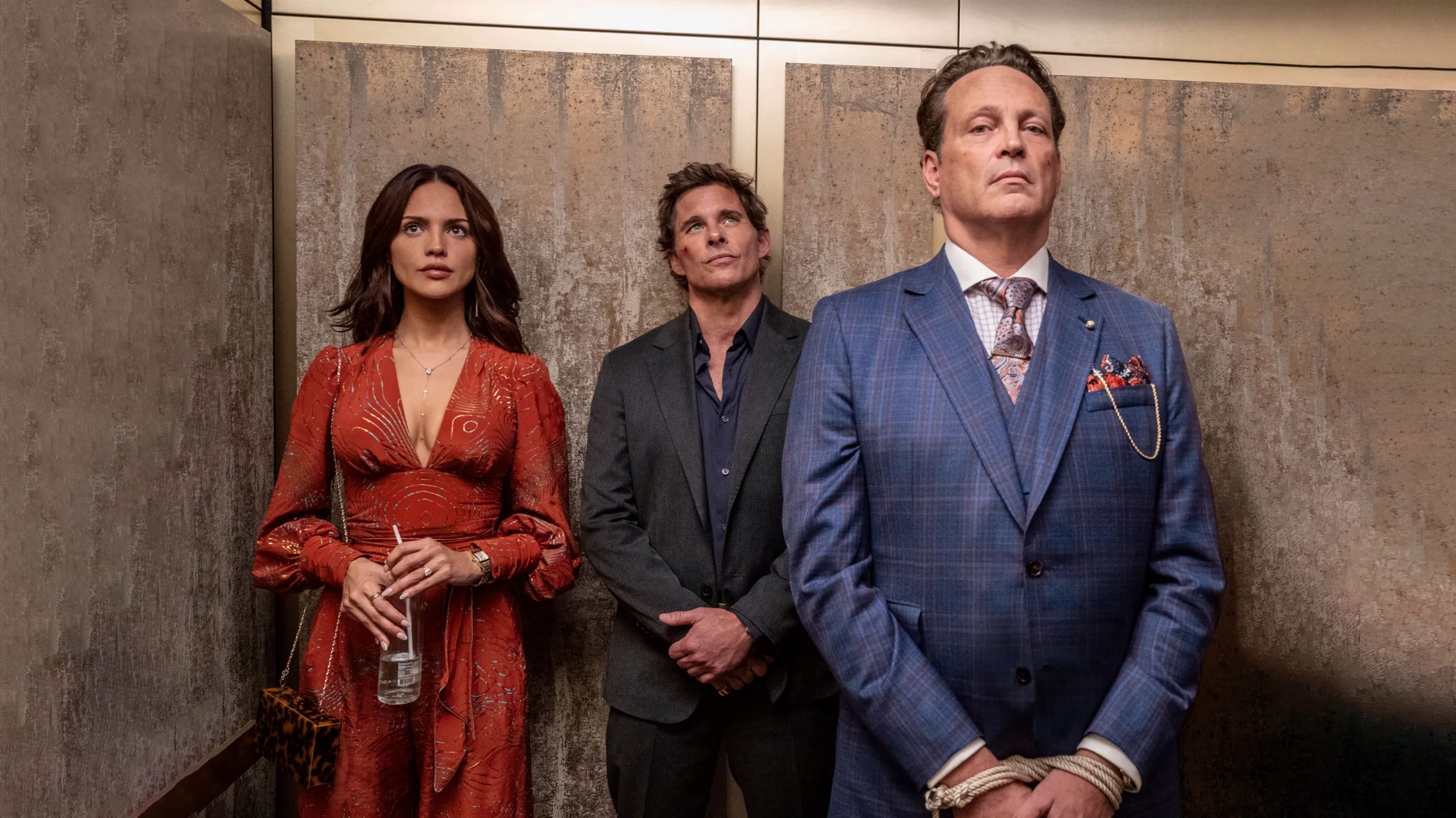 Alice (Eiza González), Mike (James Marsden) and Nick (Vince Vaugn) in an elevator in Mike & Nick & Nick & Alice.